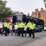 Protestors England bus