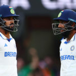 BRISBANE, AUSTRALIA - DECEMBER 17: Akash Deep and Jasprit Bumrah of India chat between wickets during day four of the Third Test match in the series between Australia and India at The Gabba on December 17, 2024 in Brisbane, Australia. (Photo by Chris Hyde/Getty Images)