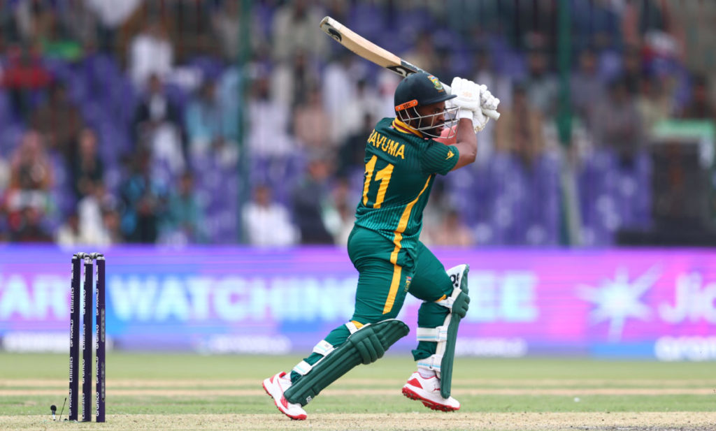 KARACHI, PAKISTAN - FEBRUARY 21: Temba Bavuma of South Africa plays a shot during the ICC Champions Trophy 2025 match between Afghanistan and South Africa at National Stadium on February 21, 2025 in Karachi, Pakistan. (Photo by Chris Hyde-ICC/ICC via Getty Images)